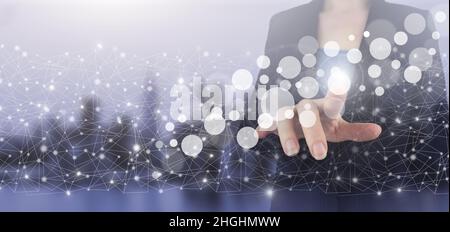 Innovation, big data concept technology. Hand touch mockup digital screen hologram circles sign on city light blurred background. Innovative, and glob Stock Photo