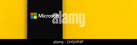 Kharkov, Ukraine - January 19, 2021: Microsoft logo closeup, web banner with copy space on a yellow background Stock Photo