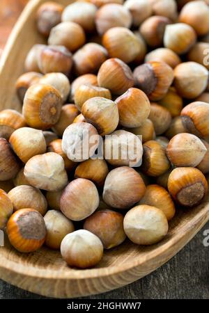 hazelnuts and autumn leaves Stock Photo