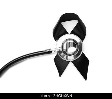 Black ribbon and stethoscope on white background. Melanoma concept ...