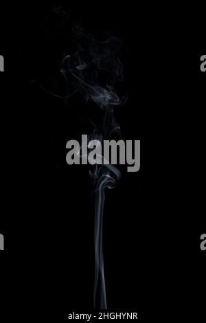 White smoke on black background, mvement of smoke. Isolated. Stock Photo