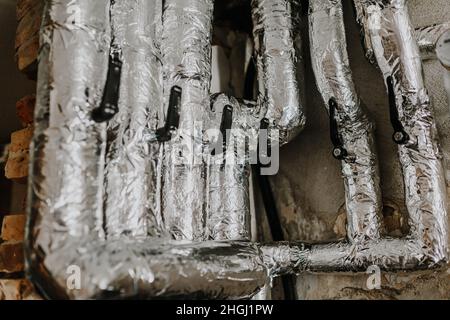 Wrapped Aluminum and Steel Pipes Close Up Stock Photo