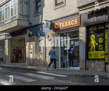 Manacor, Spain; january 20 2022: Main facade of a tobacco shop with a customer about to enter, in the Majorcan town of Manacor, Spain Stock Photo