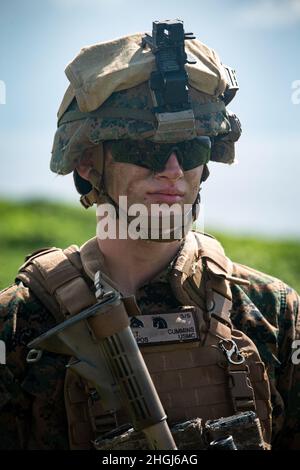 A mortarman fires an Expeditionary Fire Support System 120mm mortar ...