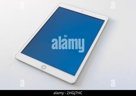 Barcelona, 2022: Tablet with Wordpress logo on an empty background. Blogs and technology. Copy space Stock Photo