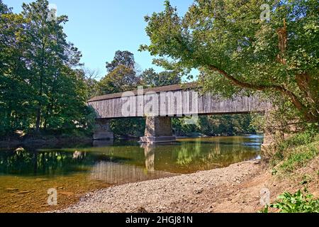 Schofield Ford Covered Bridge at Tyler State Park in Bucks  County,Pennsylvania. Over Neshaminy Creek with reflections. Stock Photo