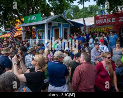 FALCON HEIGHTS, MN - 23 AUG 2019: Senator Amy Klobuchar, presidential candidate, greets crowd of people at her political booth at the State Fair, the Stock Photo