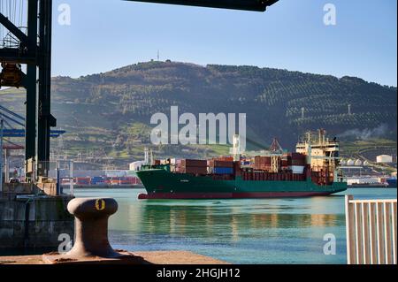 Container ship entering the Santurce terminal of the port of Bilbao, Santurce, Biscay, Basque Country, Euskadi, Spain Stock Photo