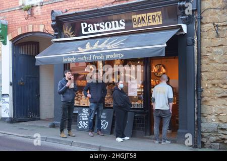 Wootton-under-Edge is a smaal town in the southern cotswolds.   Queing for a snack at Parsons Bakery. Stock Photo