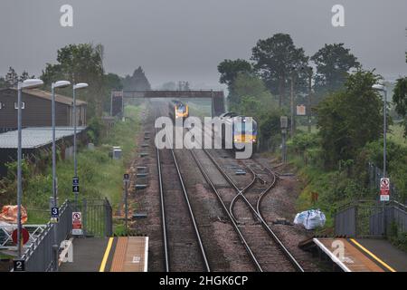 Crosscountry trains class 221 passing 2 Direct Rail Services class 68 locomotives with a freight train in the passing loop @ Ashchurch for Tewkesbury Stock Photo