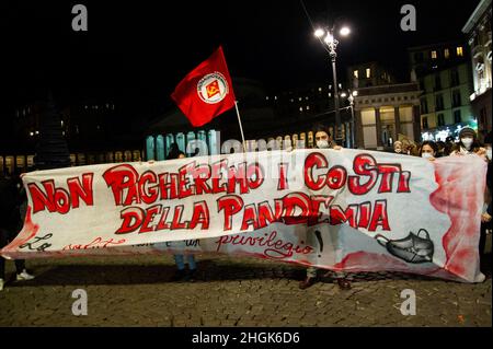 Naples, Italy. 21st Jan, 2022. Banner maintained by demonstrators in Piazza Plebiscito in Naples with the inscription 'We will not pay the costs of the Pandemic, health is not a privilege' during the citizens' demonstration for the new coronavirus laws. Credit: Vincenzo Izzo/Alamy Live News Credit: Vincenzo Izzo/Alamy Live News Stock Photo