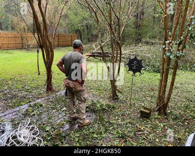 U.S. Border Patrol agents assigned to the Lake Charles Border Patrol station clear debris from Hurricane Ida in Baton Rouge, La., August 30, 2021. CBP Stock Photo