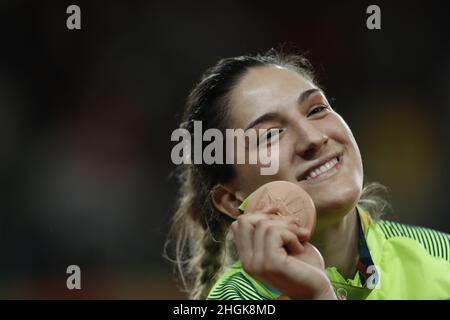 Brazil's judoka Mayra Aguiar wins bronze medal, judo 78kg at Rio 2016 Olympic Games. Brazilian champion beats half-heavyweight cuban Yalennis Castillo Stock Photo