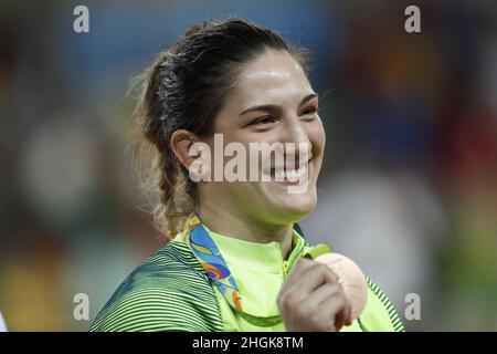 Brazil's judoka Mayra Aguiar wins bronze medal, judo 78kg at Rio 2016 Olympic Games. Brazilian champion beats half-heavyweight cuban Yalennis Castillo Stock Photo