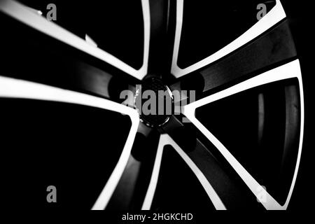 Black alloy wheels for premium cars, close-up. Purchase and replacement of autodisks. Stock Photo