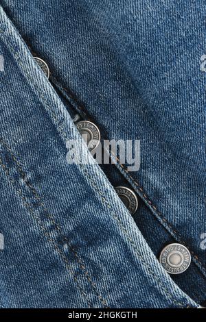 Close up of the details of new LEVI'S 501 Jeans. Buttons and seams close-up. Classic jeans model. LEVI'S is a brand name of Levi Strauss and Co, found Stock Photo