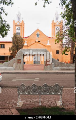 The adobe styled San Felipe de Neri Church in Old Town Albuquerque, New Mexico. One of the oldest buildings in the city, rebuilt in 1793. Stock Photo