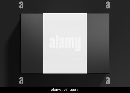Flat box mock up with blank paper cover label: Black gift box on black background. View above Stock Photo