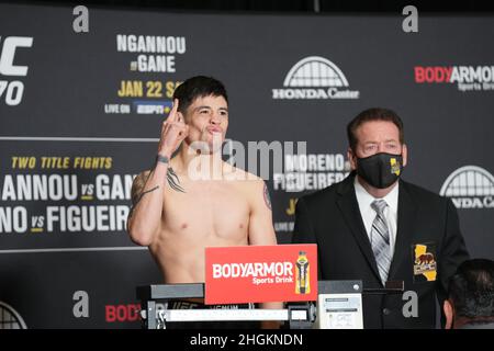 Anaheim, USA. 21st Jan, 2022. ANAHEIM, CA - January 21: Brandon Moreno steps on the scale at Hilton Convention Center for UFC270 - Ngannou vs Gane - Official Weigh-in on January 21, 2022 in Anaheim, California, United States. (Photo by Louis Grasse/PxImages) Credit: Px Images/Alamy Live News Stock Photo