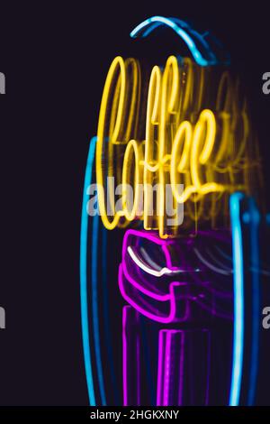Bright neon at night with coffee label Stock Photo