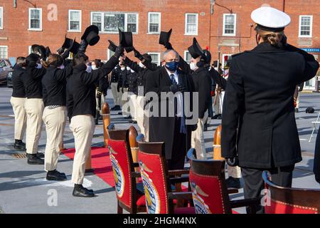 Boston, USA. 20th Jan, 2022. U.S. Secretary of the Navy Carlos Del Toro renders a salute as he passes through honor cordon of Side Boys during the Change of Command ceremony for the tail sailing ship USS Constitution, January 21, 2022 in Boston, Massachusetts. Del Toro attended the ceremony as Cmdr. Billie Farrell became the 77th commander and the first female commander of the Constitution, the oldest commissioned warship afloat. Credit: MC2 Skyler Okerman/U.S. Navy/Alamy Live News Stock Photo