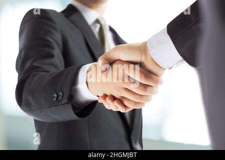 business concept - businessman shaking hands Stock Photo