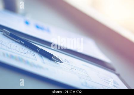 Drawings and charts of successful business, workplace of the businessman Stock Photo