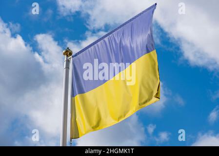 The flag of Ukraine is a banner of two equally sized horizontal bands of blue and yellow Stock Photo