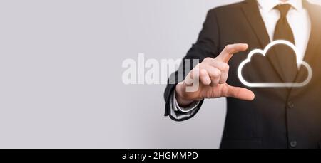 Hand holding icon cloud computing network and icon connection data information in hand. Cloud computing and technology concept Stock Photo
