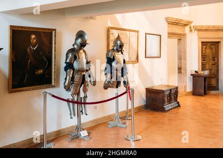 Mir, Belarus. Armor of the knights warriors In Armored Room In Castle Complex Museum. Famous Landmark, Architectural Ensemble Of Feudalism, Ancient Stock Photo