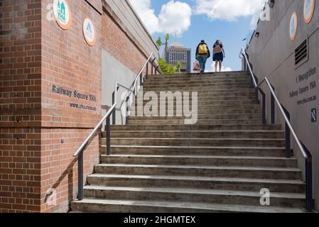 Stairs leading up to Railway Square and the entrance to The Youth Hostel Association accommodation (YHA) at Central Station in Sydney Australia Stock Photo