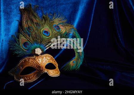 Luxury venetian mask on dark blue background. Carnival masquerade fantasy mask Stock Photo