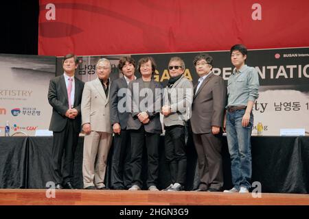 October 6, 2012 - Busan, South Korea : (From lest)Lee Yong-kwan, festival director of the Busan International Film Festival, South Korean actor Lee Kyeong-yeong, actor Park Weon-sang, director Chung Ji-young, actor Myung Gye-nam, actor Seo Dong-soo and actor Kim Jung-gi pose together druing a press conference to promote their movie 'National Security' at the Busan International Film Festival in Busan, South Korea, Saturday, Oct. 6, 2012. The film based on the memoir of a democracy activist who was tortured in the 1980s by South Korea's military rulers is provoking discussion about the country' Stock Photo