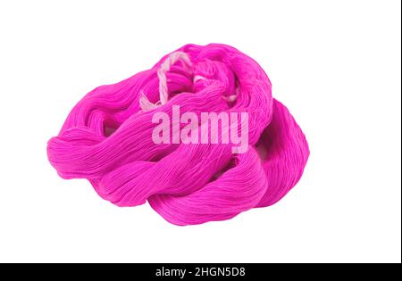 Colorful pink color thread, cotton craft threads on white canvas background. Stock Photo