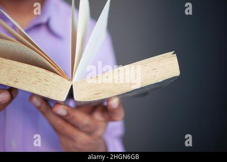Close up of women hand turning a pager of a diary  Stock Photo