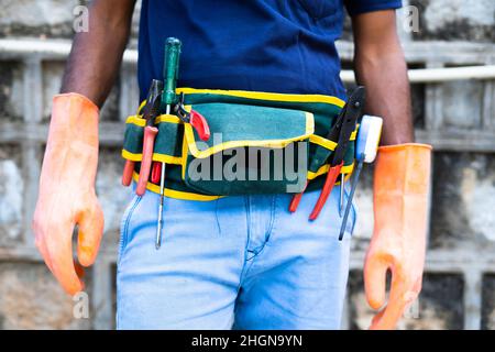 Close up shot of unrecongnizable electrician working by using tools or equipments for maintenance service - concept of get ready to working Stock Photo