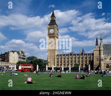 England. London. Houses of Parliament from Parliament Square with classic red Routemaster, double-decker bus. Stock Photo