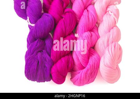 Colorful color threads, cotton craft threads on white canvas background, top view Stock Photo