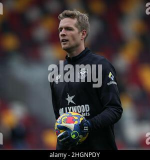 London, UK. 22nd Jan, 2022. Brentford Goalkeeper Jonas Lšssl warms up during the Premier League match between Brentford and Wolverhampton Wanderers at Brentford Community Stadium, London, England on 22 January 2022. Photo by Ken Sparks. Editorial use only, license required for commercial use. No use in betting, games or a single club/league/player publications. Credit: UK Sports Pics Ltd/Alamy Live News Stock Photo
