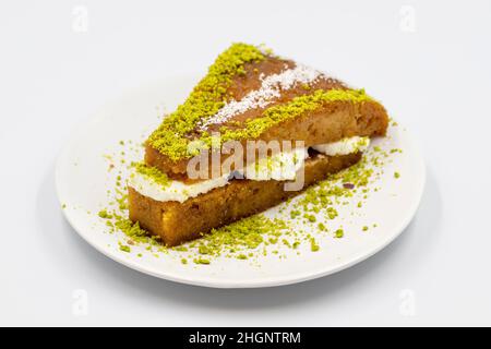 Turkish Traditional Dessert Ekmek Kadayif / Bread Pudding. Ramadan Dessert with cream Stock Photo