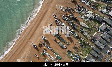 Drone overhead fishing boats on beach Hastings seaside town on Kent coast of England Stock Photo