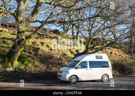 In,January,on,a,winter,winters,sunny,day,VW,Volkswagen,campervan,van,vanlife,staycation,parked,up,at,Dolbadarn Castle,grounds,a,scenic,scenery,rural,location,and,free,tourist,visitor,attraction,in,Llanberis,Llanberis village,is,a community and electoral ward in, Gwynedd, northwest Wales, on the southern bank of the lake Llyn Padarn and at the foot of Snowdon, the highest mountain in Wales.Rural,countryside,scenic,scenery,in,on,at,Snowdonia,Snowdonia National Park,Mid,North,West,Kingdom,North Wales,Wales,Welsh,GB,Great Britain,British,UK,United Stock Photo