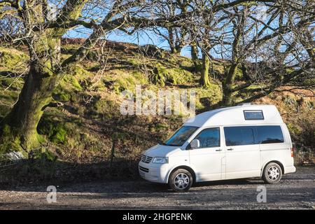 In,January,on,a,winter,winters,sunny,day,VW,Volkswagen,campervan,van,vanlife,staycation,parked,up,at,Dolbadarn Castle,grounds,a,scenic,scenery,rural,location,and,free,tourist,visitor,attraction,in,Llanberis,Llanberis village,is,a community and electoral ward in, Gwynedd, northwest Wales, on the southern bank of the lake Llyn Padarn and at the foot of Snowdon, the highest mountain in Wales.Rural,countryside,scenic,scenery,in,on,at,Snowdonia,Snowdonia National Park,Mid,North,West,Kingdom,North Wales,Wales,Welsh,GB,Great Britain,British,UK,United Stock Photo
