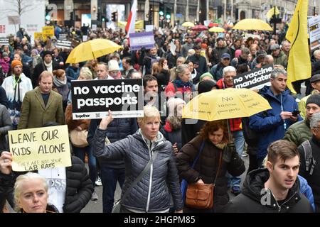 London, UK. 22 January 2022. World Wide Rally for Freedom. Anti vaccine protesters and NHS staff march from the BBC office in London against covid tests, mask requirements and jabs. Credit: Andrea Domeniconi/Alamy Live News Stock Photo