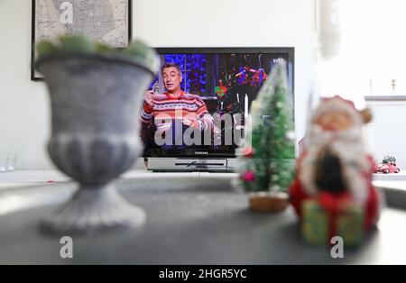 This year, Tareq Taylor's was given the glorious traditional task of lighting the candle on Christmas Eve during Sveriges Television's broadcast. Stock Photo