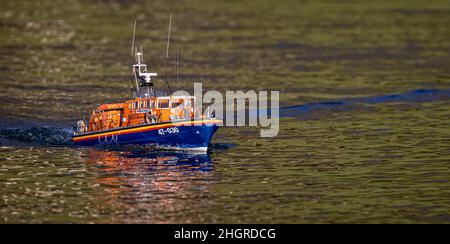 Close up of model RNLIB life boat on lake Stock Photo