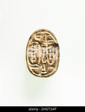 Scarab of Queen Inni ca. 1700–1676 B.C. Middle Kingdom This scarab-shaped seal-amulet is inscribed with the name and royal titles of Queen Inni (Dynasty 13).. Scarab of Queen Inni. ca. 1700–1676 B.C.. Faience. Middle Kingdom. From Egypt, Memphite Region, Lisht North, Cemetery, MMA excavations, 1920–22. Dynasty 13 Stock Photo