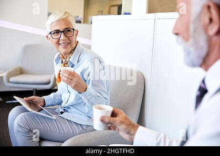 senior busniess people talking office communication Stock Photo