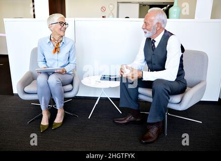 senior busniess people talking office communication Stock Photo