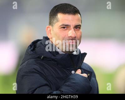 Aue, Germany. 22nd Jan, 2022. Soccer: 2nd Bundesliga, FC Erzgebirge Aue - FC Schalke 04, Matchday 20, Erzgebirgsstadion. Schalke's Dimitrios Grammozis stands in the stadium. Credit: Robert Michael/dpa-Zentralbild/dpa - IMPORTANT NOTE: In accordance with the requirements of the DFL Deutsche Fußball Liga and the DFB Deutscher Fußball-Bund, it is prohibited to use or have used photographs taken in the stadium and/or of the match in the form of sequence pictures and/or video-like photo series./dpa/Alamy Live News